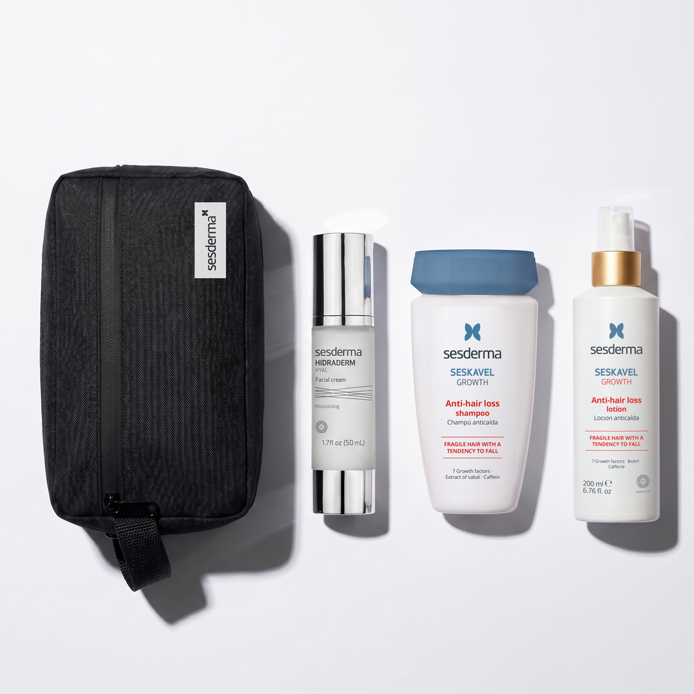 Sesderma Hair Care & Hydration Bundle featuring Hidraderm Hyal moisturizing facial cream, Seskavel Growth anti-hair loss shampoo, and Seskavel Growth anti-hair loss lotion, displayed with a black Sesderma travel toiletry bag